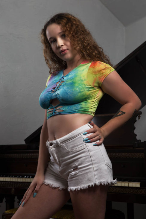 Image of SassySavage and her colorful shirt