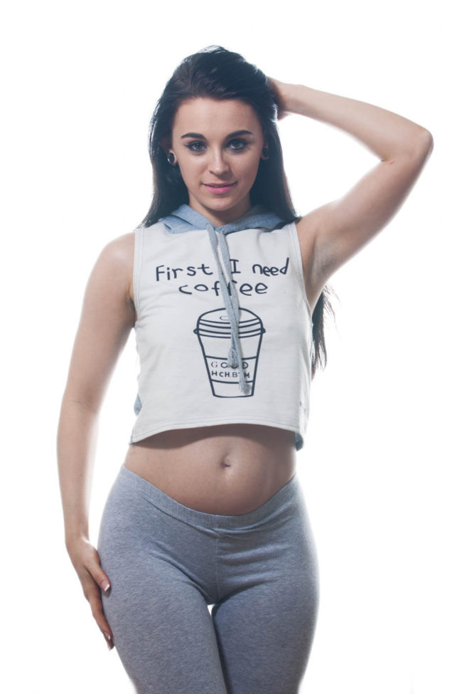 Image of Silvia wearing a coffee first shirt