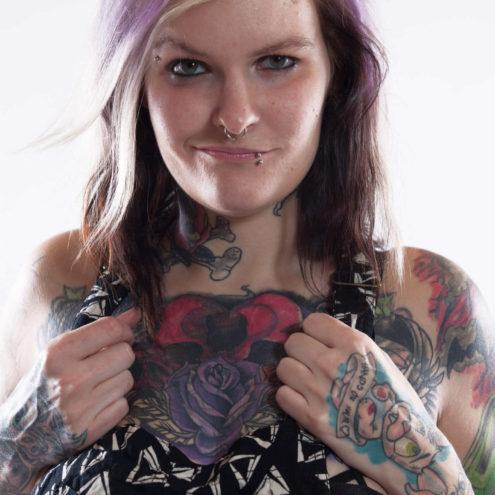 Image of Hannah Batgirl showing off chest bones