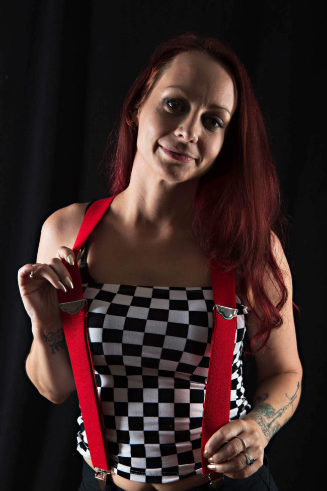 Image of Lucy Greene wearing a checkered top