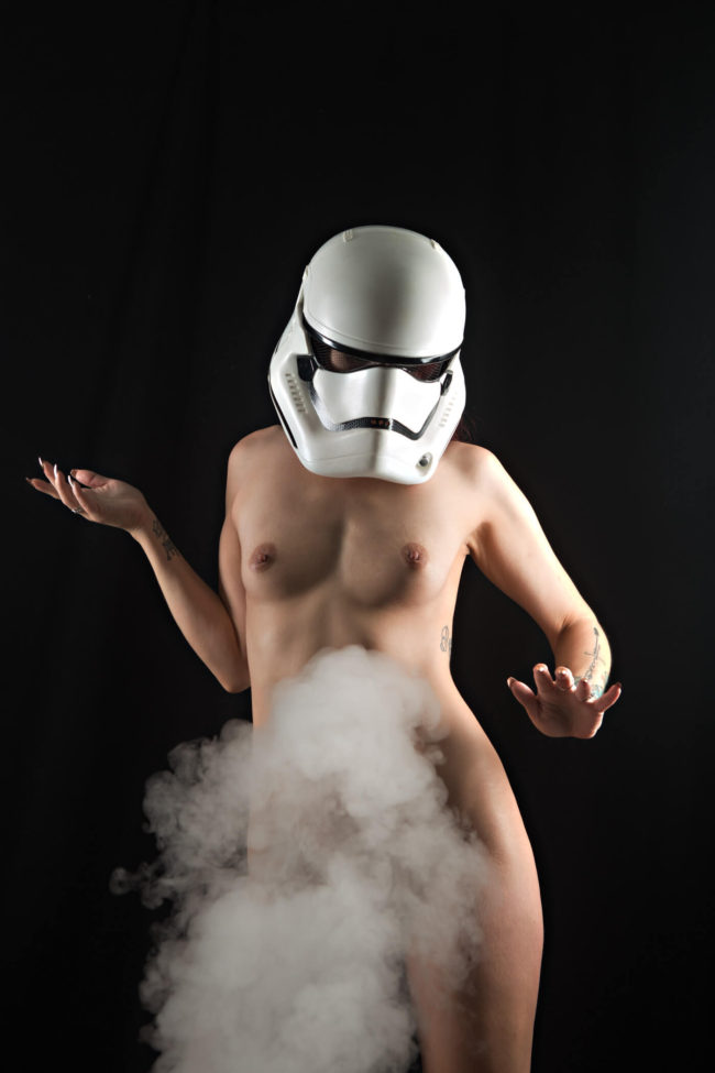 Image of Lucy Green wearing stormtrooper helmet