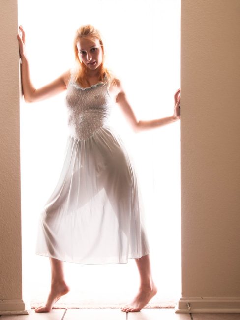 Image of Kat Murray wearing sheer in doorway