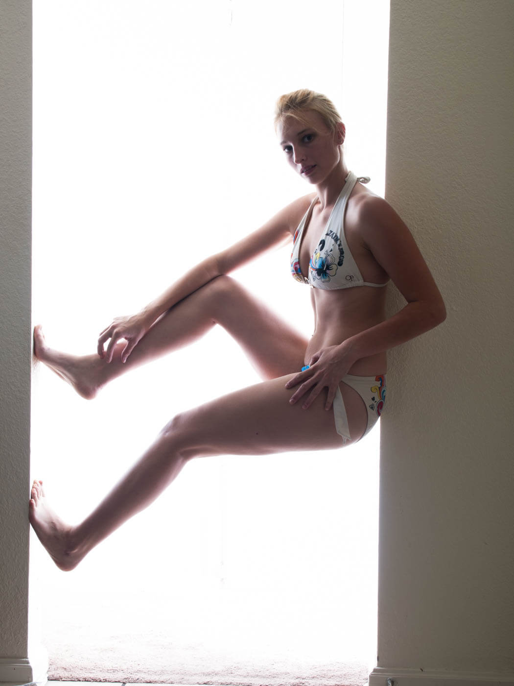 Image of Kat Murray posing in door way