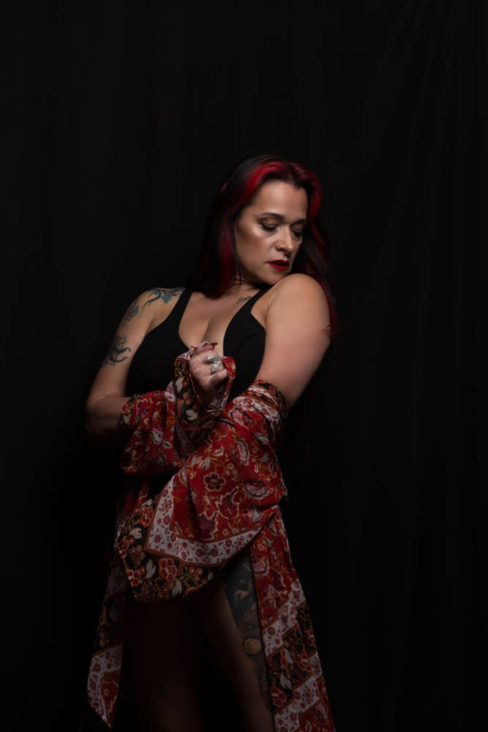 Image of Landa Model wearing a maroon robe with design