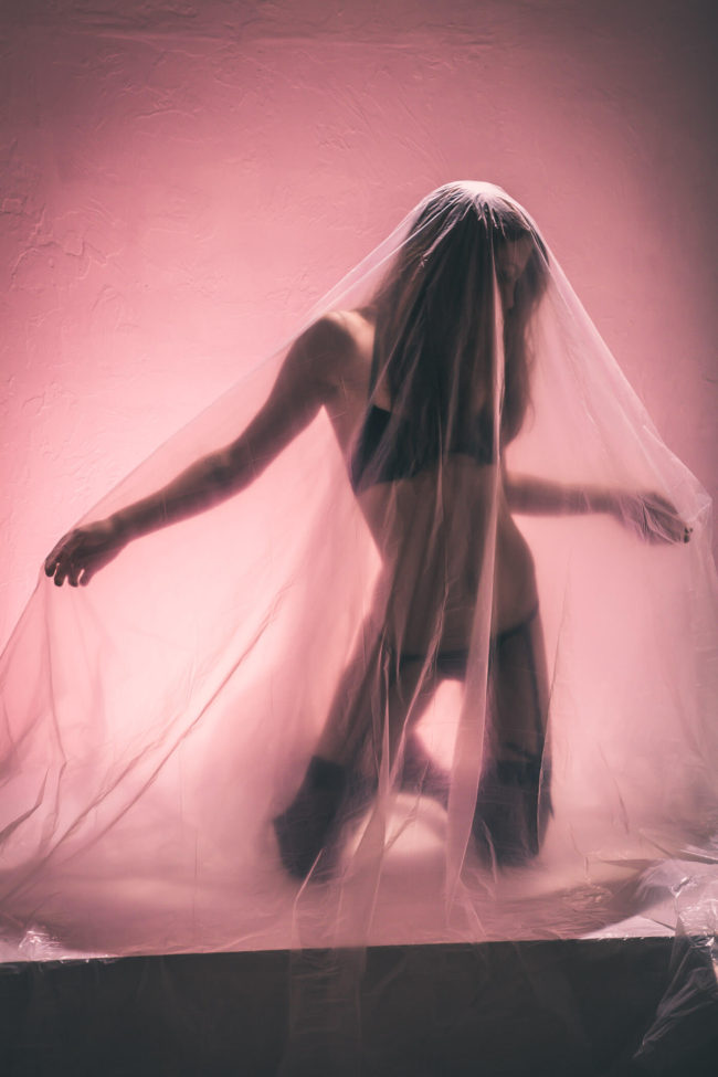 Image Shelby Parton under plastic sheet