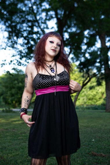 Two models posing together outdoors in unique fashion outfits during an evening photography meetup.